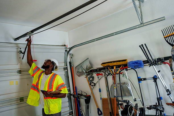 Professional Garage Door Panel Replacement technician working in Holland, MI